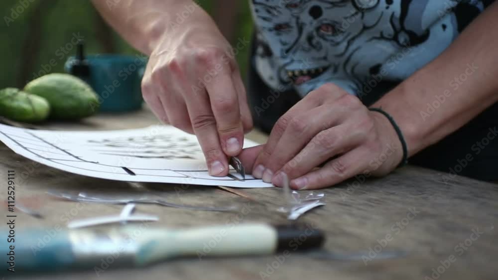 cutting the stencil cutting the stencil