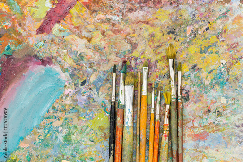 View from above of time-worn paintbrushes