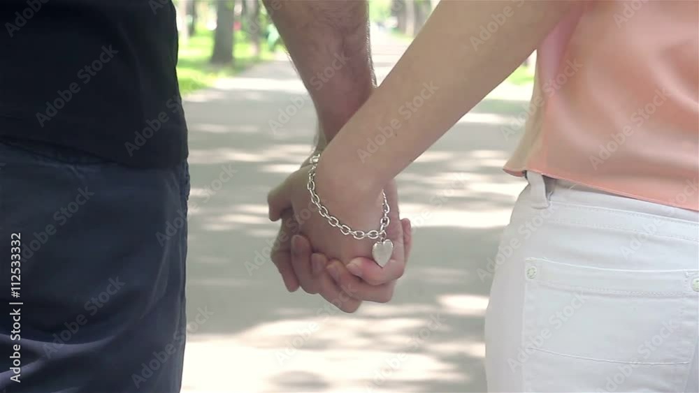 couple in love holding hands and leaves couple in love holding hands and leaves
