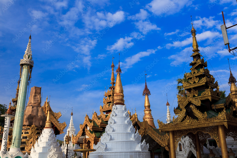 Shwedagon Pagoda Temple shining in the beautiful sunset in Yangon, Myanmar (Burma)