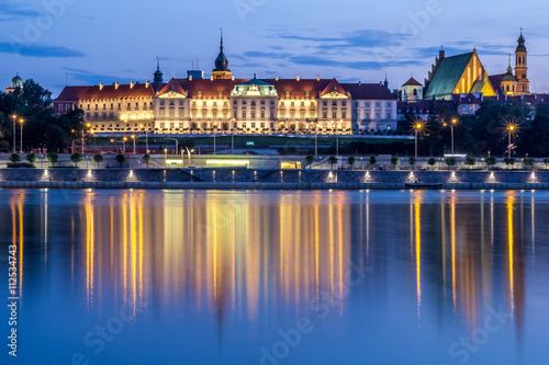 The Royal Castle over the Vistula river in Warsaw, Poland photo