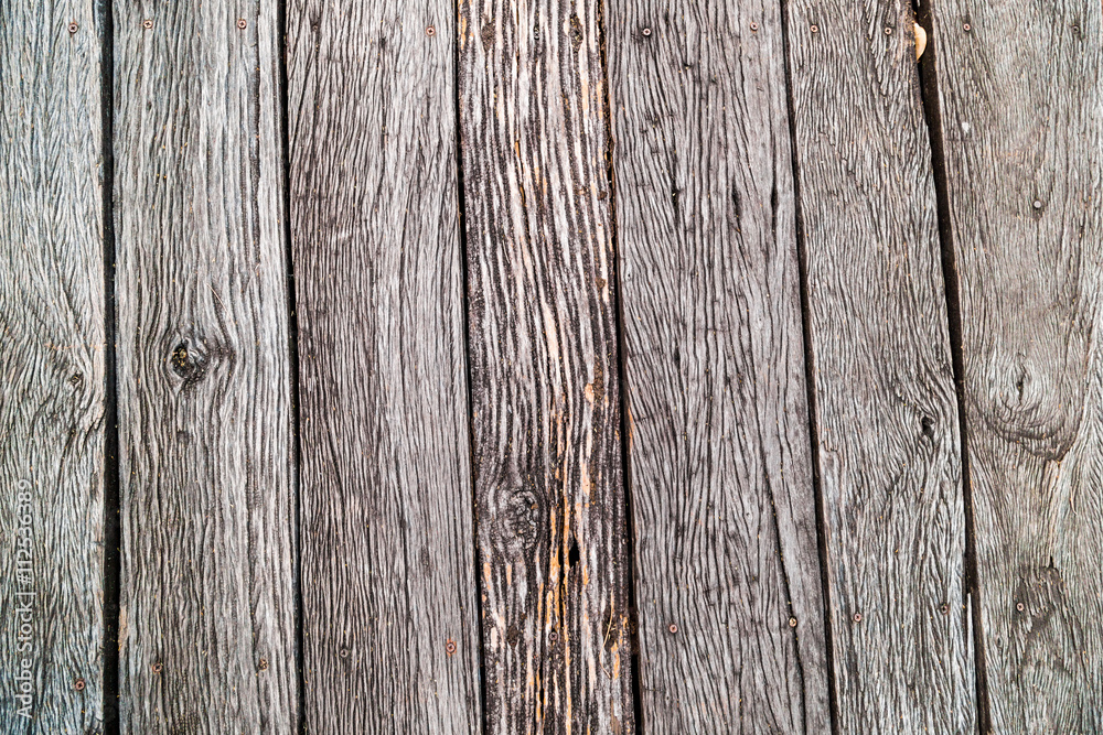 Hard old wood pavement floor viewed from above, brown wooden texture.