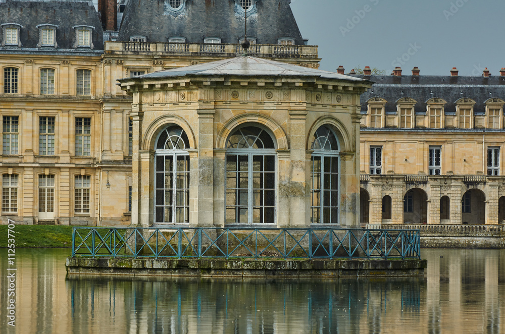 Pond and the palace of Fontainebleau in France.