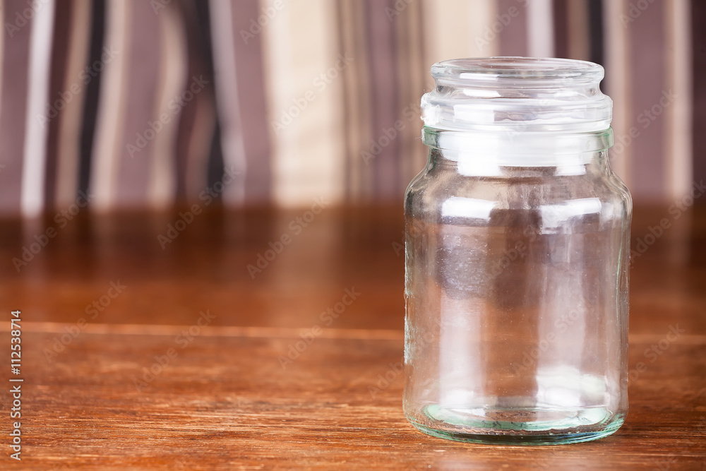Empty jar dark wooden background savings. Empty jar dark wooden background savings.