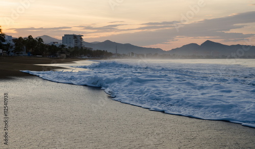 Sunrise on the beach in Mexico. Manzanillo Colima photo