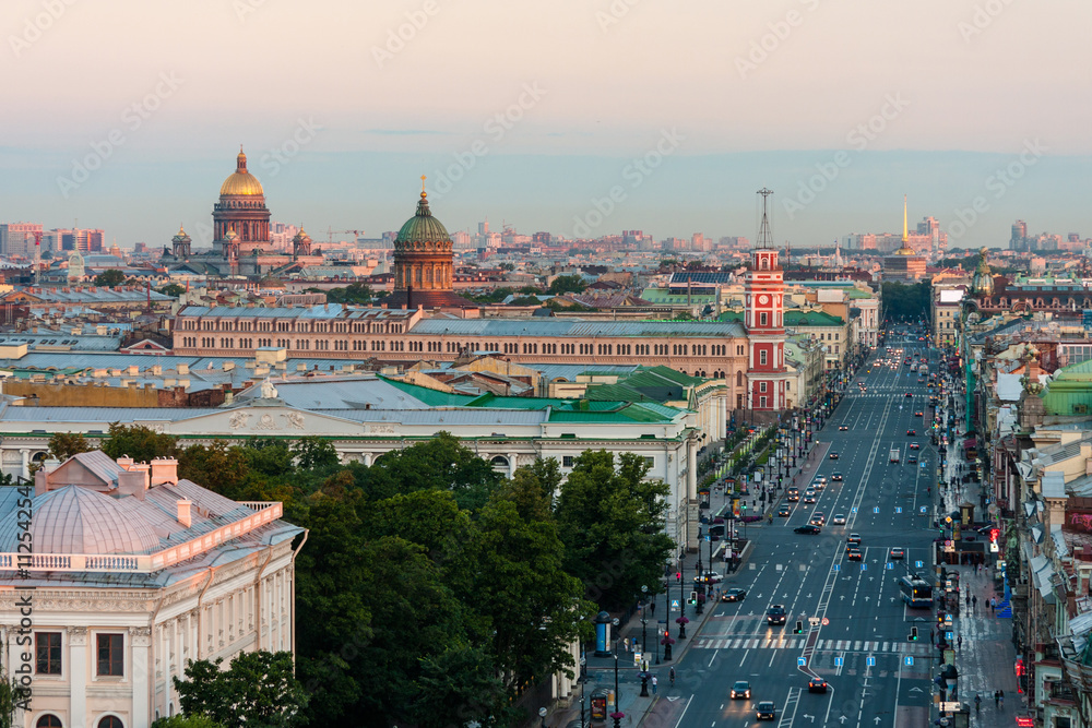 View of the Nevsky Prospekt morning without cars in St. Petersburg from height. On the horizon you can see St. Isaac's Cathedral and Kazan Cathedral.