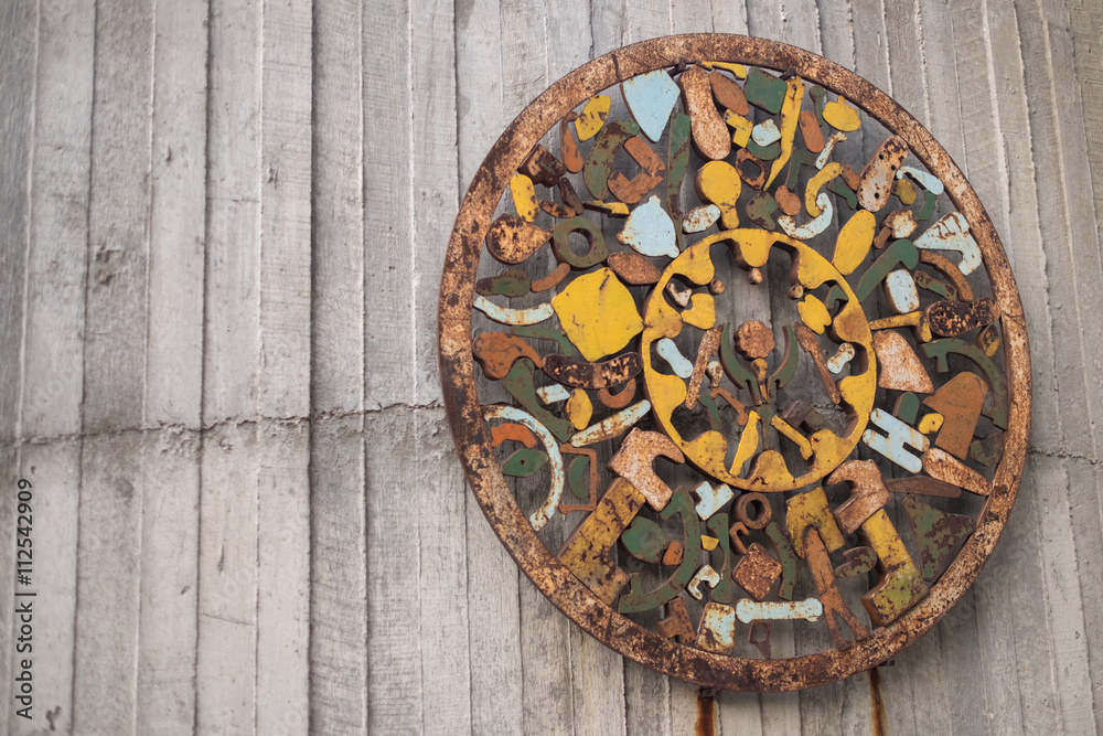 old decoration on wooden wall rusty decoration circle decoration item antique decoration colorful decoration