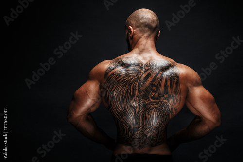 Obraz na plátně View of tattooed man's back