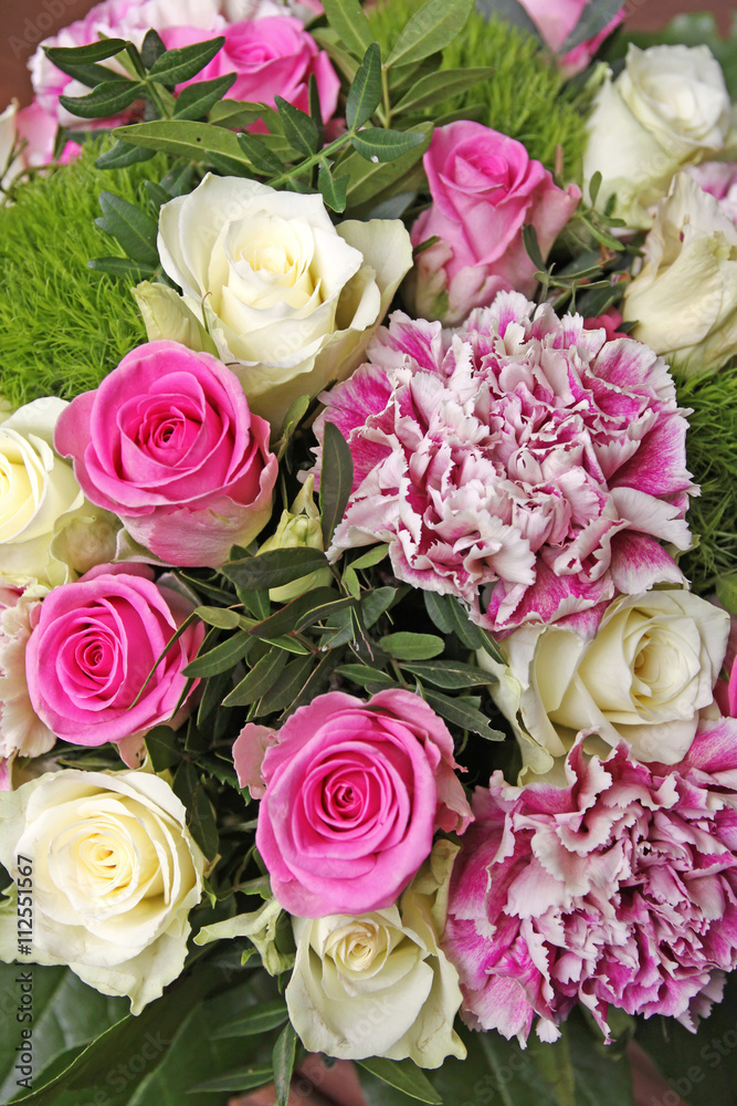 pink and white roses and carnations
