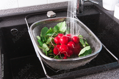 Rinse vegetables with water