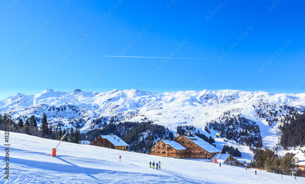 Skiers on the slopes of the ski resort of Meriber.  France