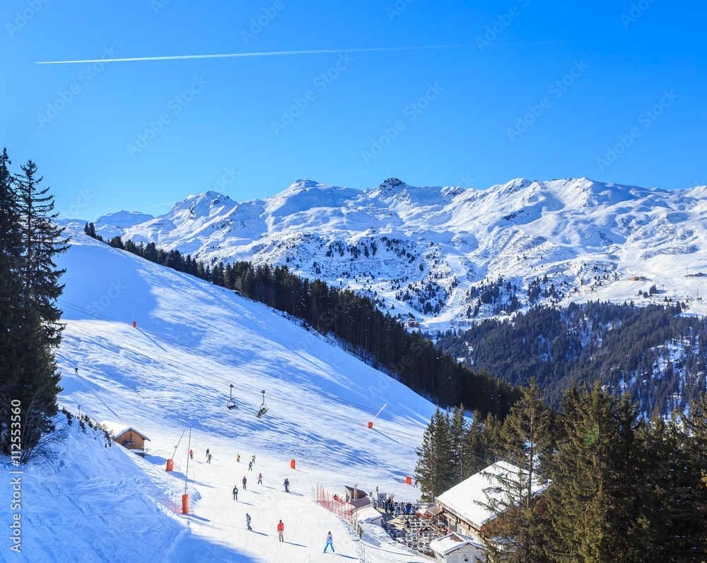 Skiers on the slopes of the ski resort of Meribel. France