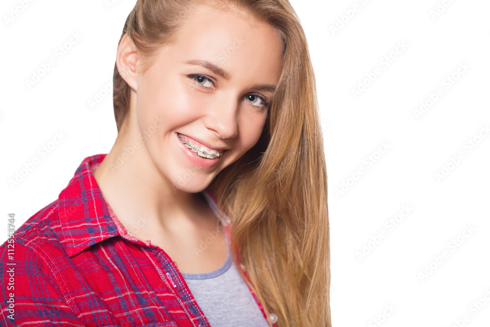 Portrait of teen girl showing dental braces. Portrait of teen girl showing dental braces.