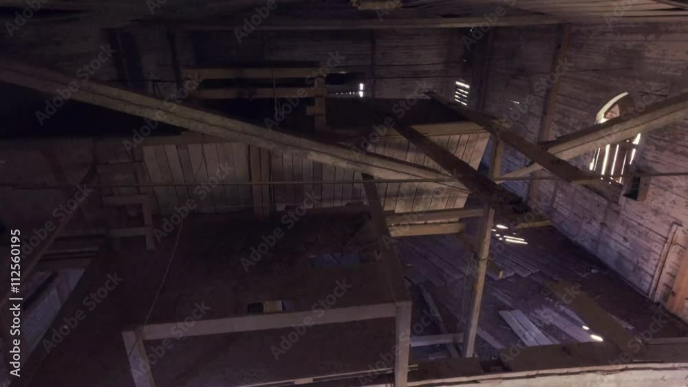 Old abandoned church or mill building. Steadicam shot. Smooth motion. Wooden building interior. Old abandoned church or mill building. Steadicam shot. Smooth motion. Wooden building interior.