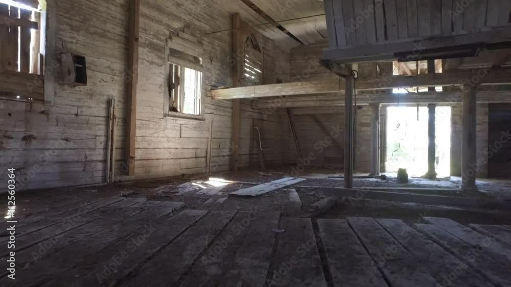 Old abandoned church or mill building. Steadicam shot. Smooth motion. Wooden building interior. Old abandoned church or mill building. Steadicam shot. Smooth motion. Wooden building interior.