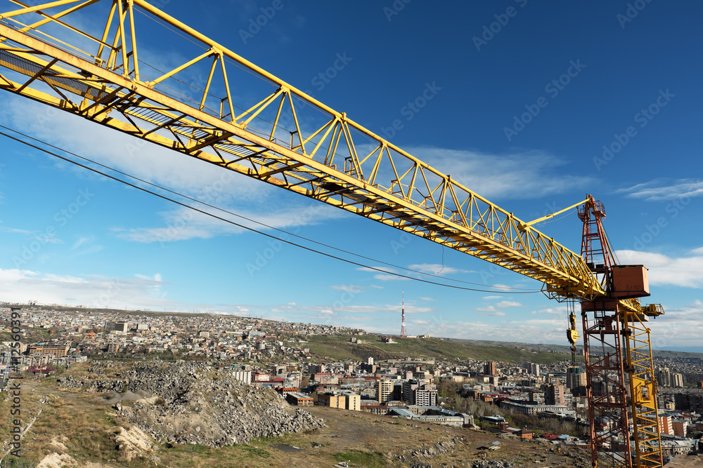 Crane tower against a blue sky