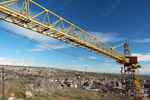 Crane tower against a blue sky