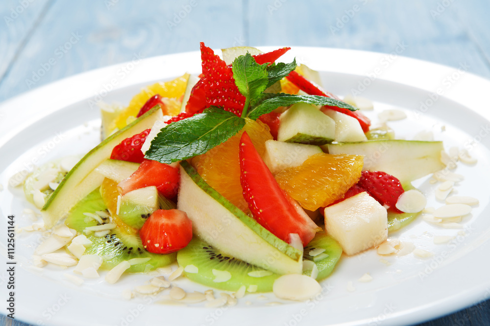 Fruit salad closeup, vegan food. Fruit salad closeup, vegan food.