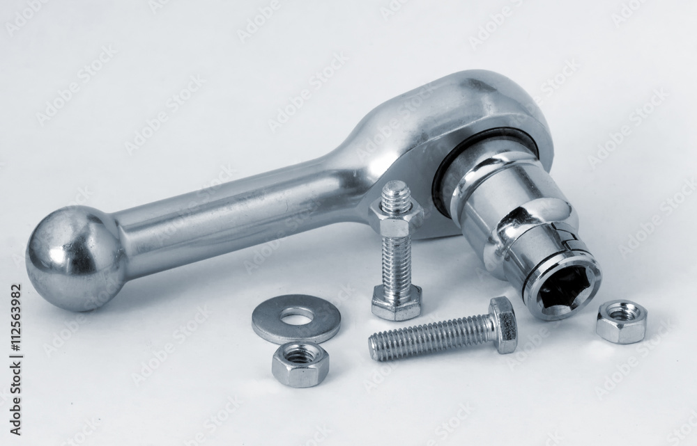 Ratchet wrench, bolts and nuts. Ratchet wrench, bolts and nuts.