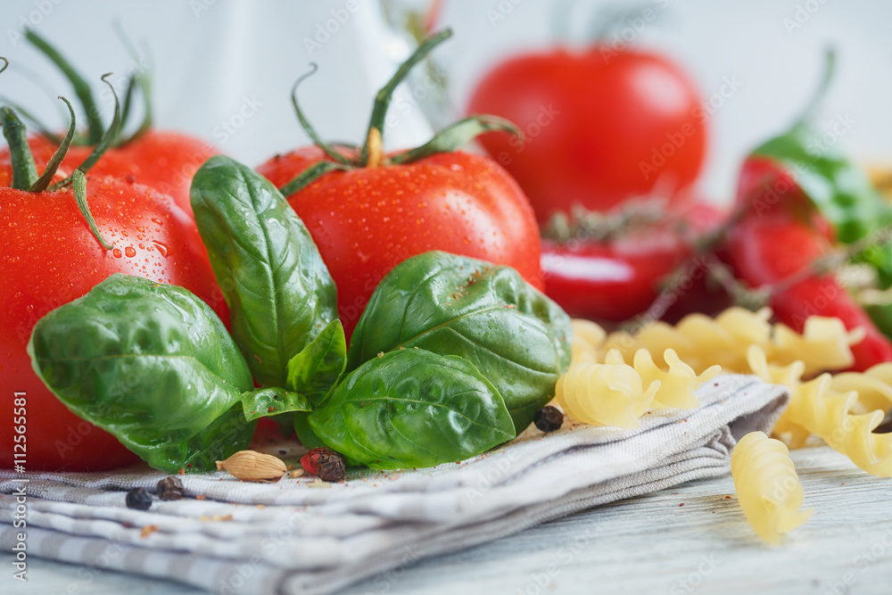 Italian food background, with tomatoes, basil, pasta, olive oil, Italian food background, with tomatoes, basil, pasta, olive oil,