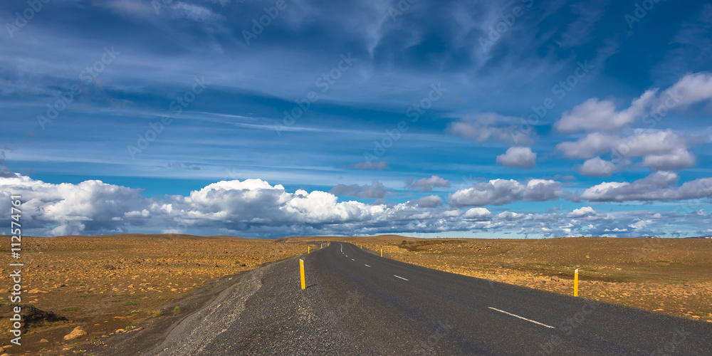 Isolated road and Icelandic colorful landscape on Iceland, summe