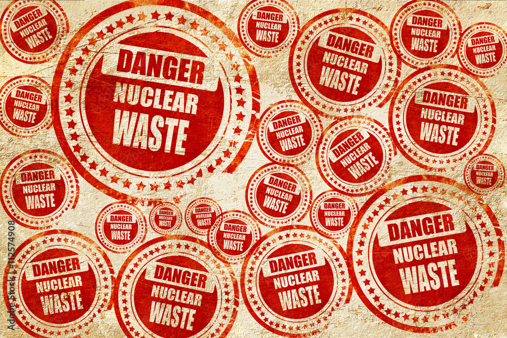 Obraz premium Nuclear danger background, red stamp on a grunge paper texture
