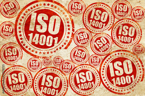 iso 14001, red stamp on a grunge paper texture