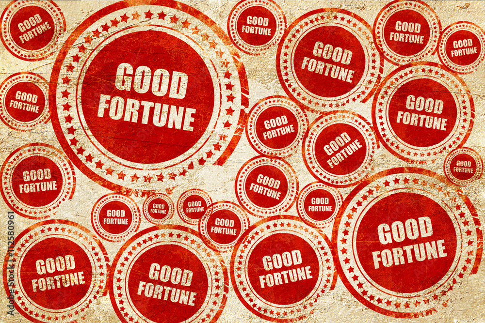 Obraz premium good fortune, red stamp on a grunge paper texture