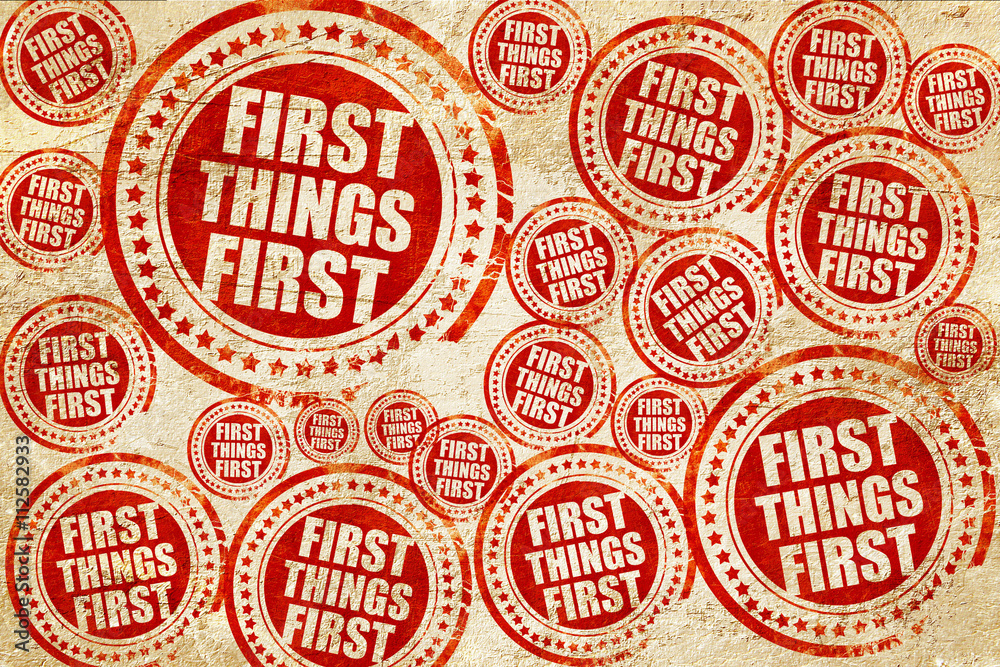 first things first, red stamp on a grunge paper texture