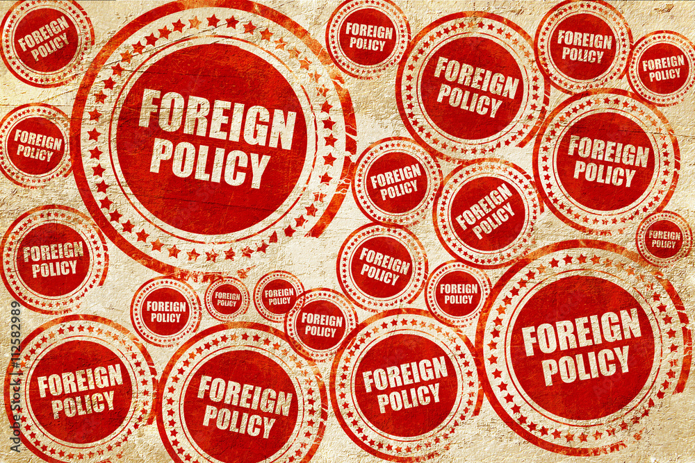 Obraz premium foreign policy, red stamp on a grunge paper texture