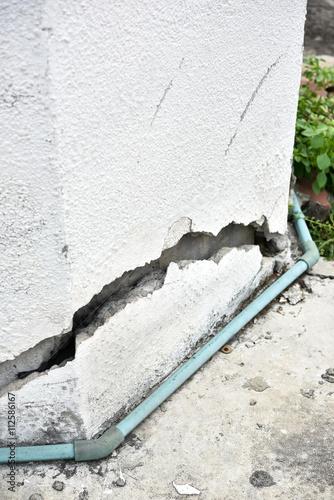 very old wall with a crack on it
