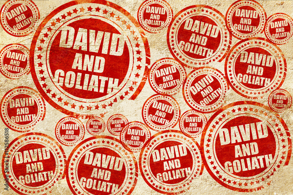 david and goliath, red stamp on a grunge paper texture