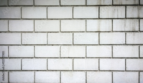 Aged gray brick wall. Used for background backdrop texture (wall, background, brick) 