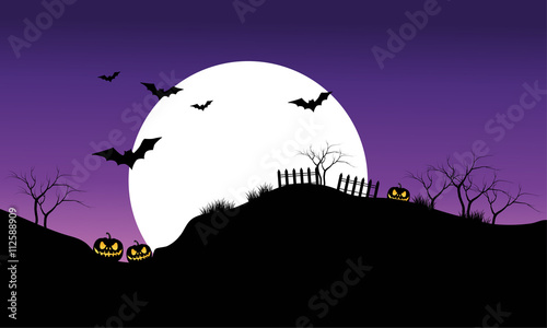 Halloween bat on purple sky backgrounds silhouette