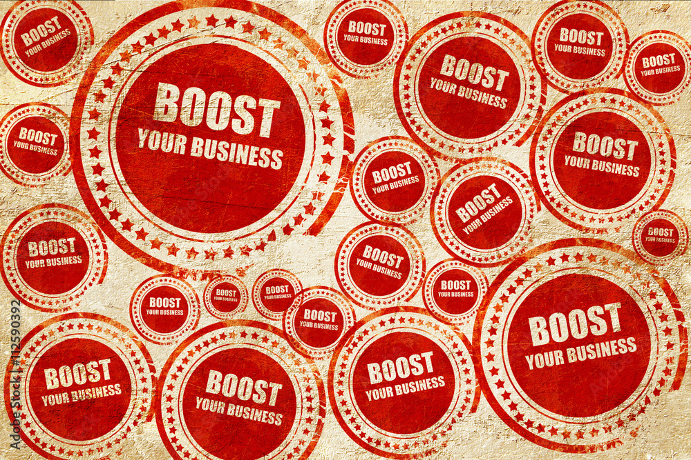 Obraz premium boost your business, red stamp on a grunge paper texture