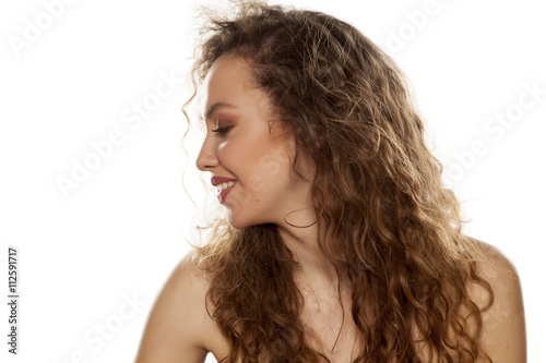 Profile of a young beautiful woman on a white background