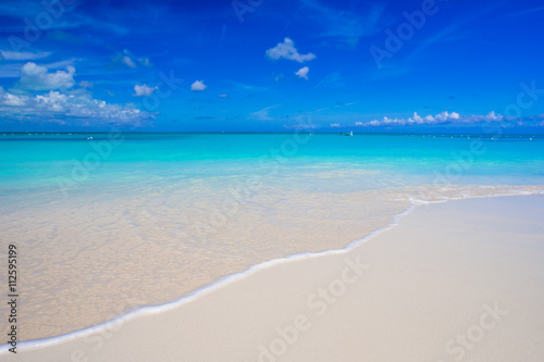 Beautiful white sand beach and turquoise clean water © travnikovstudio