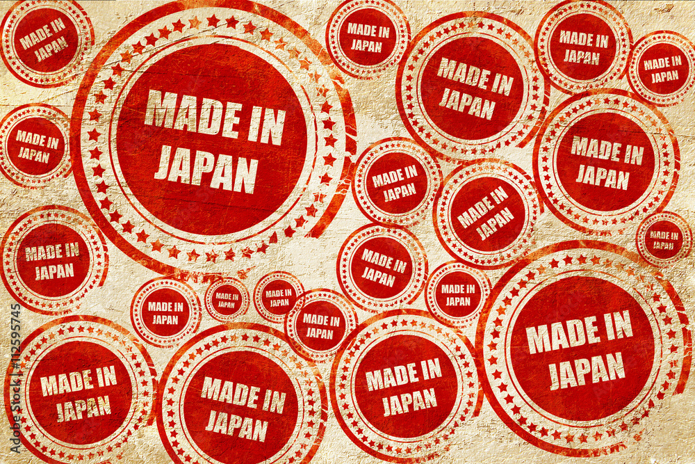 Made in japan, red stamp on a grunge paper texture Made in japan, red stamp on a grunge paper texture