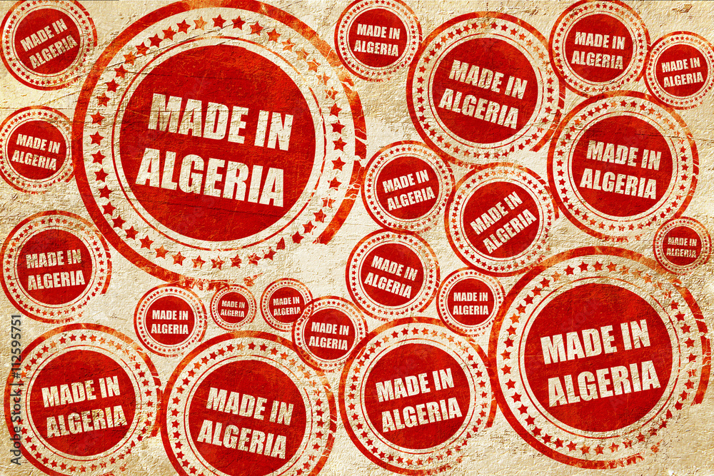 Made in algeria, red stamp on a grunge paper texture