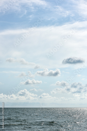 blue sea and clouds on sky