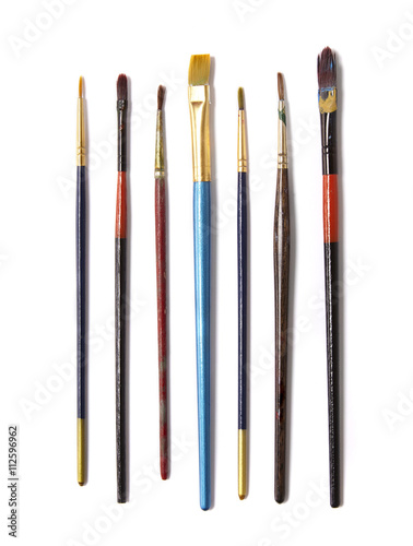 A selection of artists paint brushes isolated on a white background