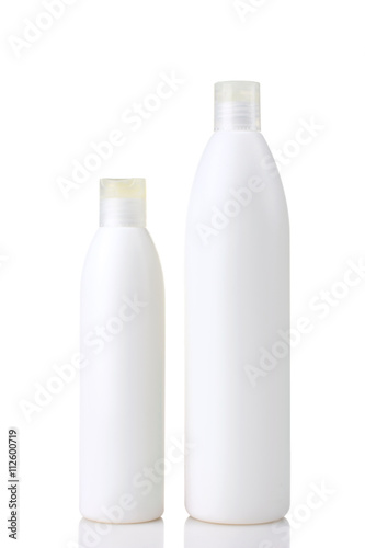 plastic bottle with a shampoo or singing tools on white isolated background