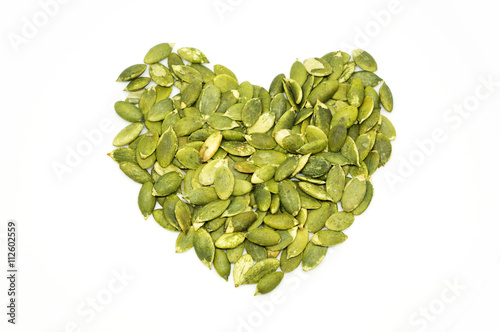 Pumpkin seeds on a white background