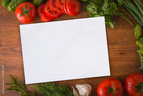 vegetables on the table with paper on the center