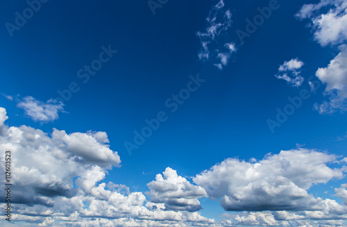 Dramatic blue sky with clou...