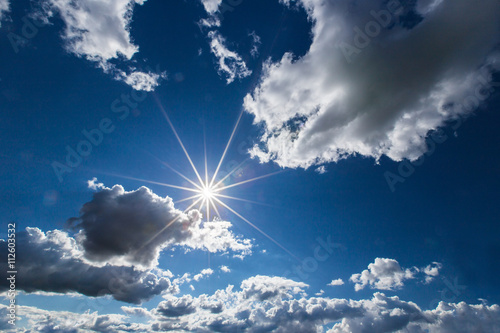 Dramatic blue sky with clou...