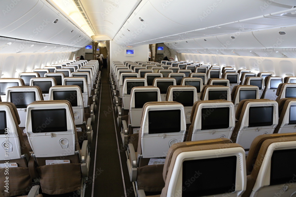 Rear part of wide body aircraft interior Stock Photo Adobe Stock