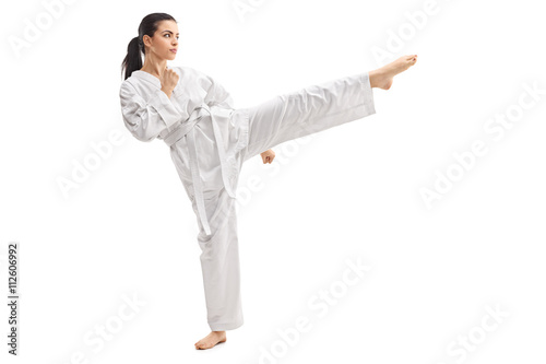 Woman practicing martial arts in a kimono