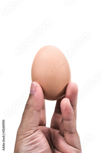 Eggs in hand on white background