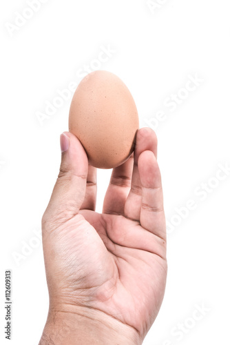 Eggs in hand on white background